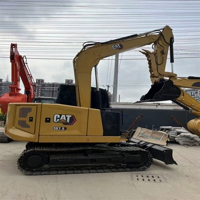 CAT 303.5E Excavadora de 3,5 toneladas con un potente cubo y una fuerza de excavación con bastón Color original
