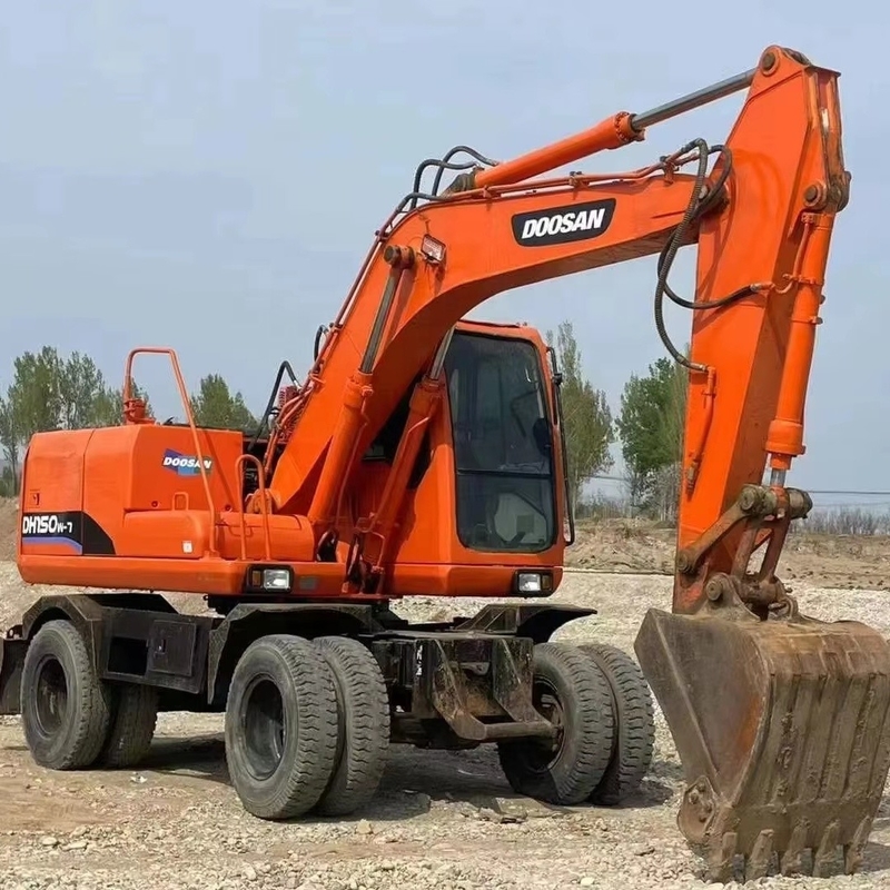 Excavadora de ruedas usada DOOSAN DX140W-7 con pintura original y motor Cummins 112kW